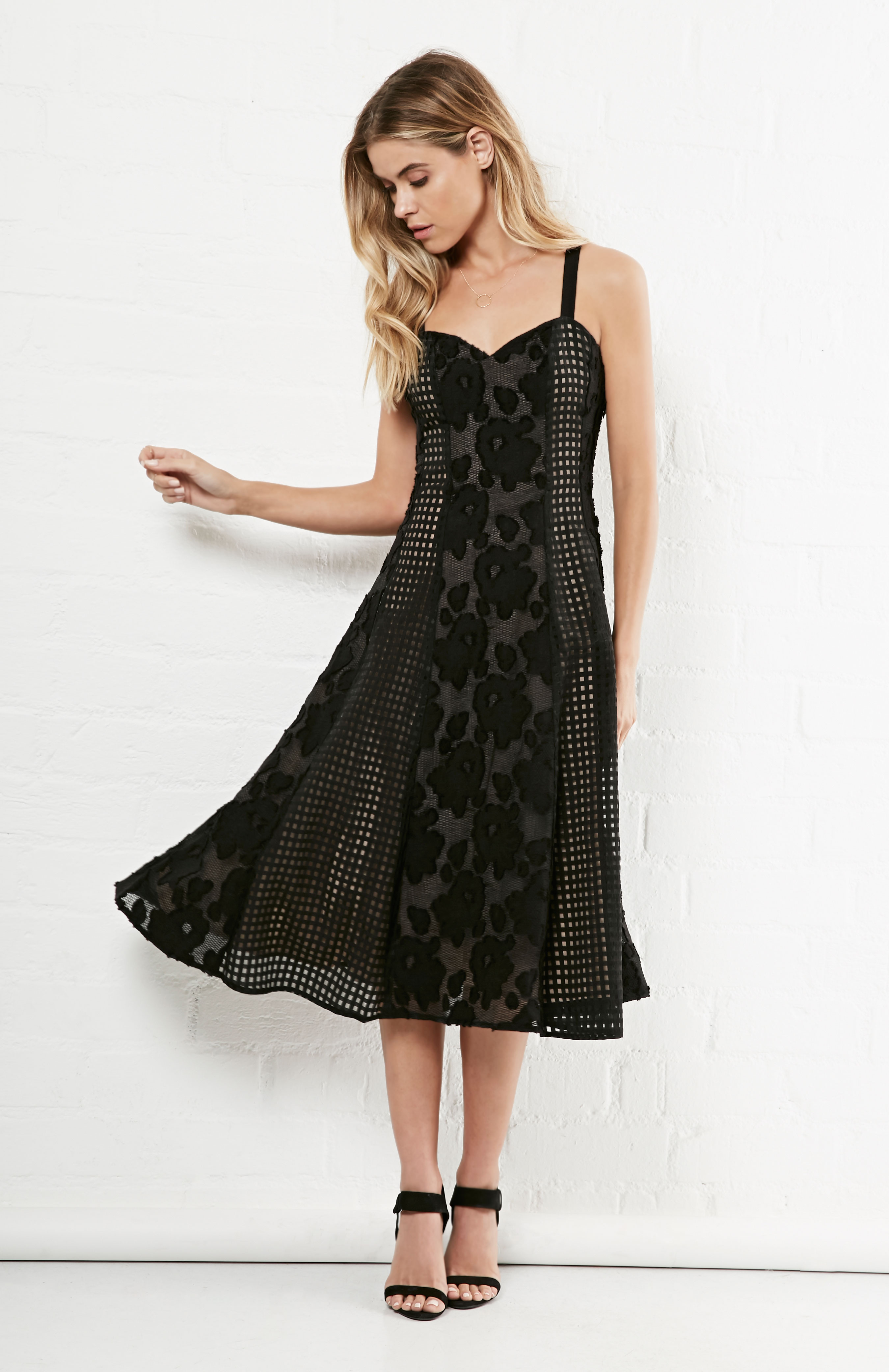 NBD Race For The Prize Dress in Black | DAILYLOOK