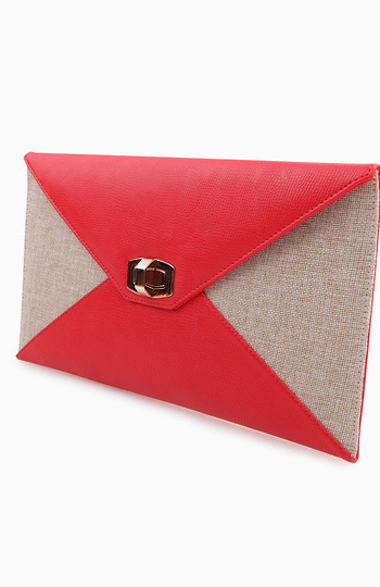 Woven Coral Clutch in Coral | DAILYLOOK